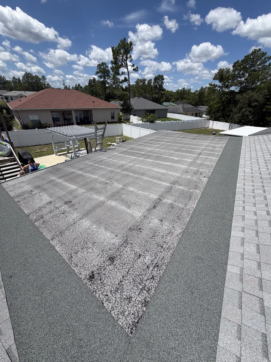 Weathered flat roof before replacement
